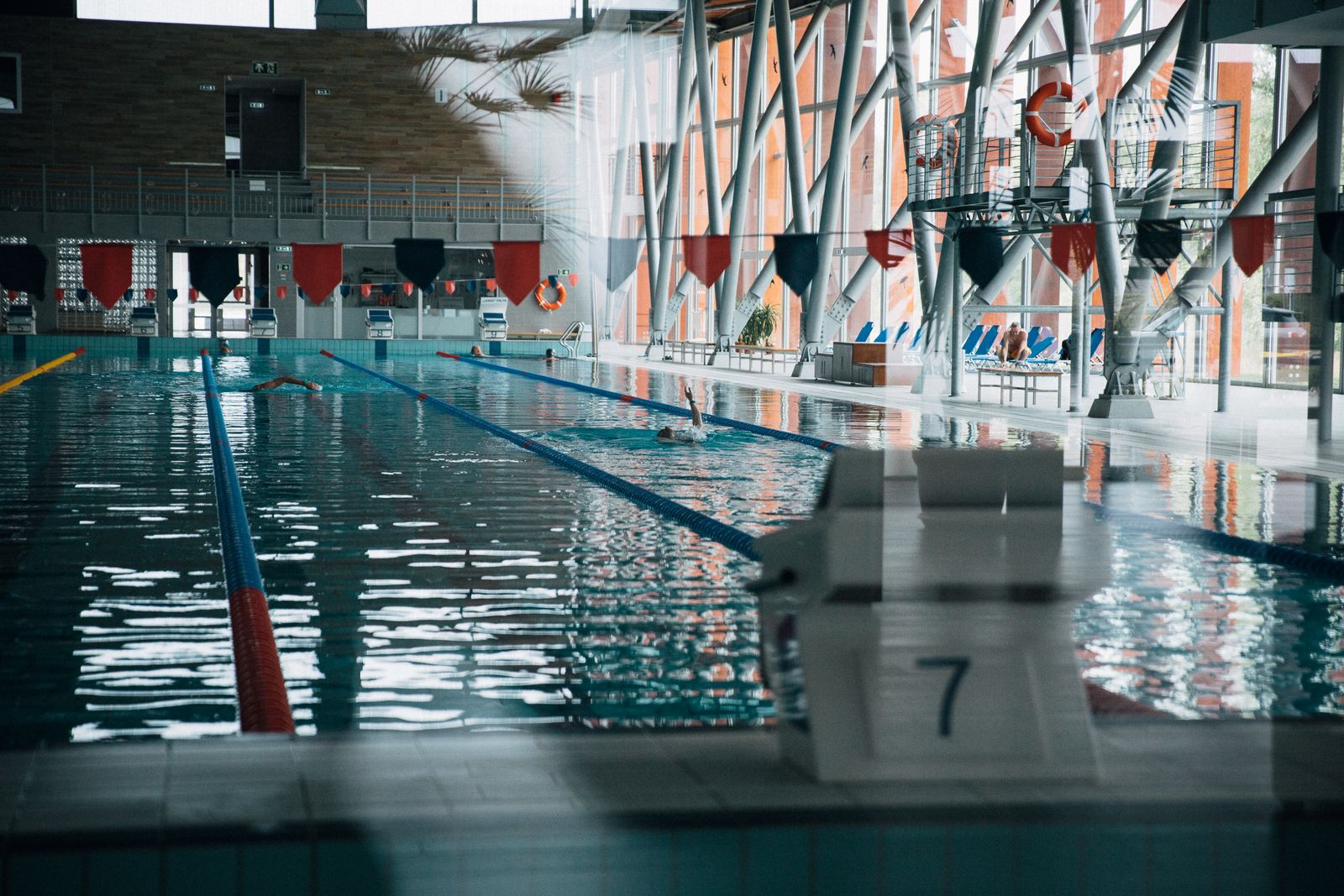Indoor pool with large windows and starting blocks