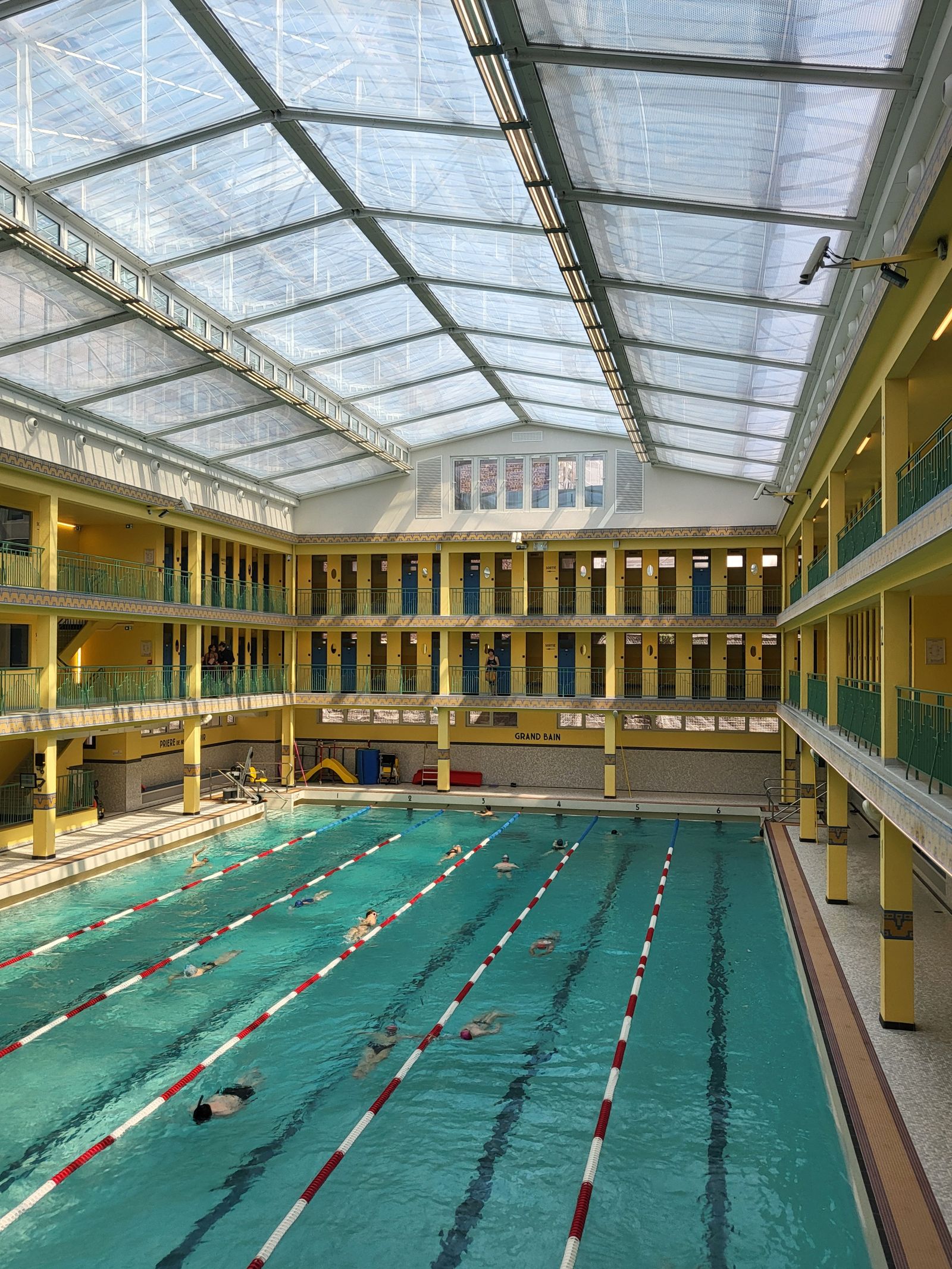 Spacious lap pool beneath a glass roof